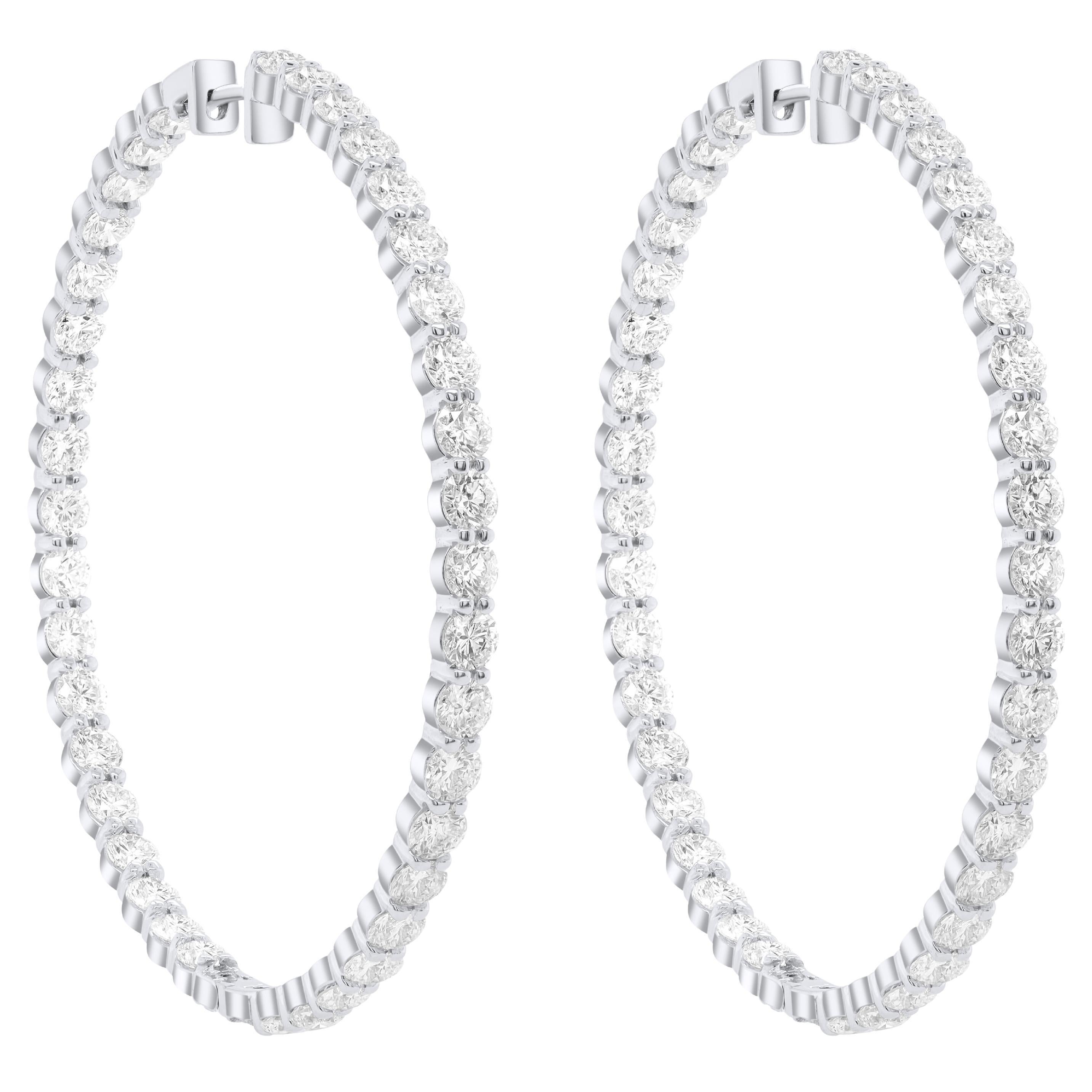 Diana M.18 kt white gold, 2.50" inside-out hoop earrings adorned with 19.00 cts 