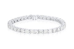 Diana M.18 kt white gold 4 prong diamond tennis bracelet adorned with 12.01 cts