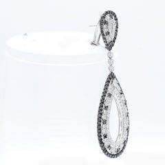 Diana M.18 kt white gold diamond earring adorned with multiple drop shaped rings