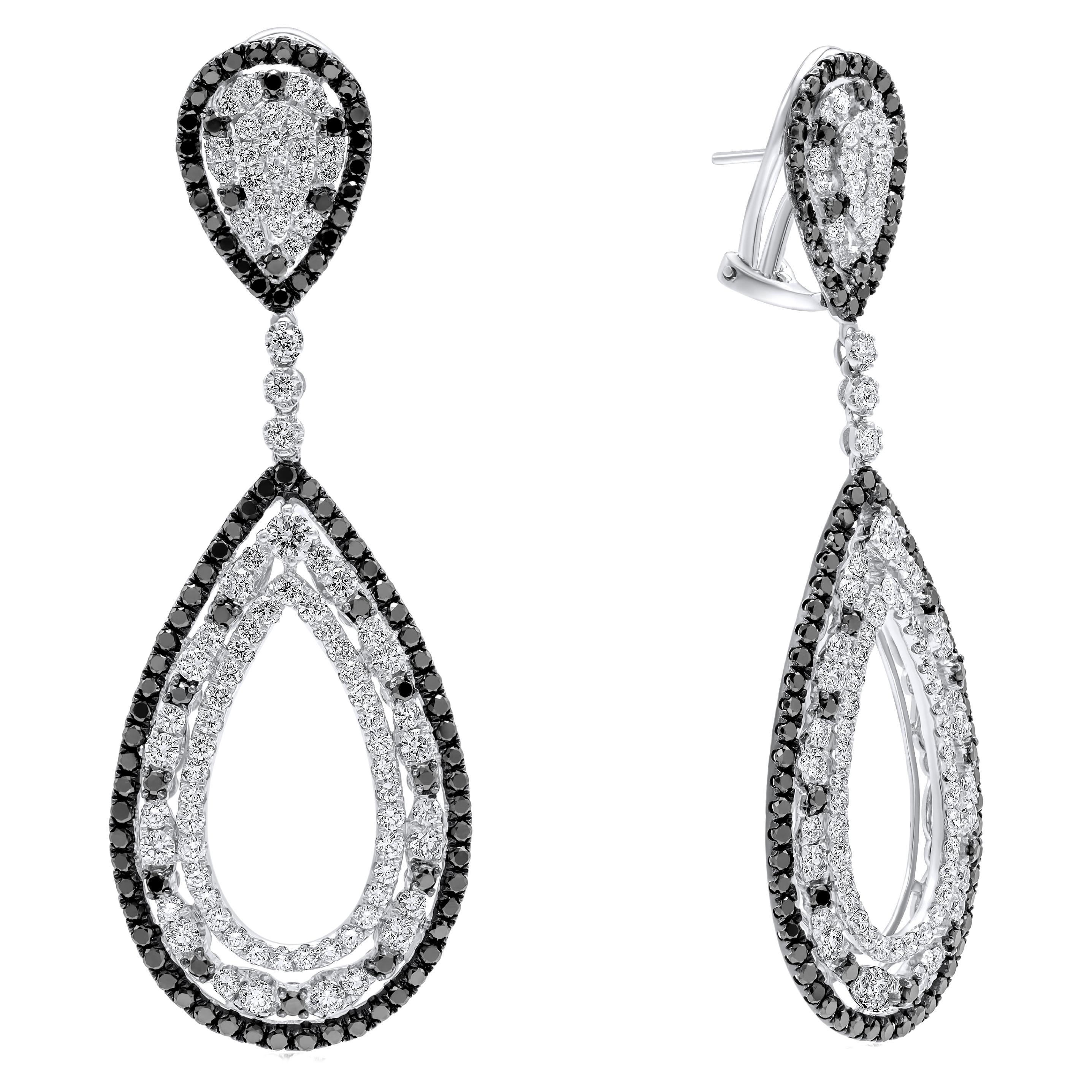 Diana M.18 kt white gold diamond earring adorned with multiple drop shaped rings For Sale