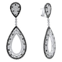 Diana M.18 kt white gold diamond earring adorned with multiple drop shaped rings