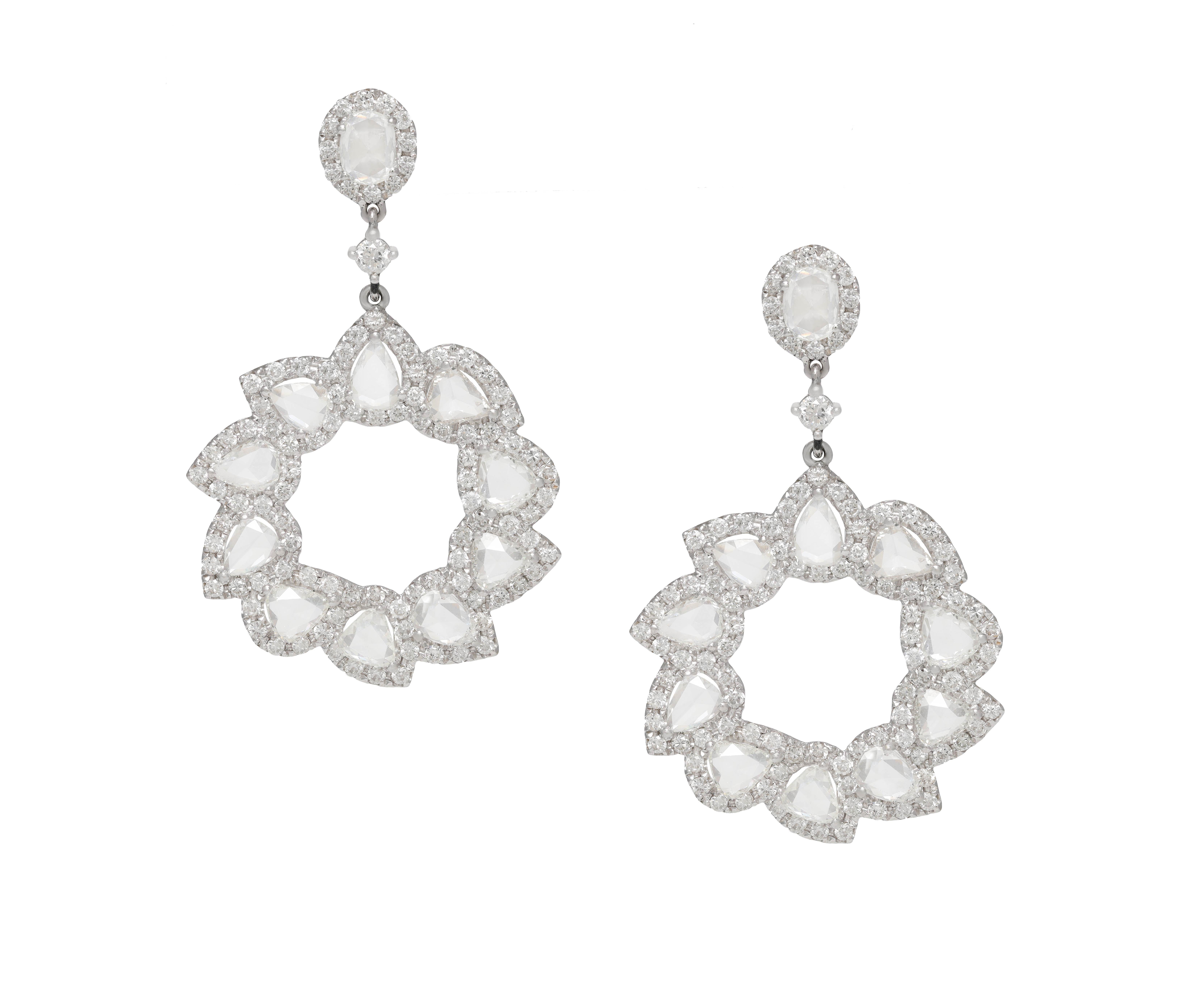 18 kt white gold diamond fashion earrings adorned with rose cut diamonds surrounded by round diamonds in a flower shape totaling 4.59 cts of diamonds.
Diana M. is a leading supplier of top-quality fine jewelry for over 35 years.
Diana M is one-stop