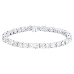 Diana M.18 kt white gold diamond tennis bracelet adorned with 10.25 cts 