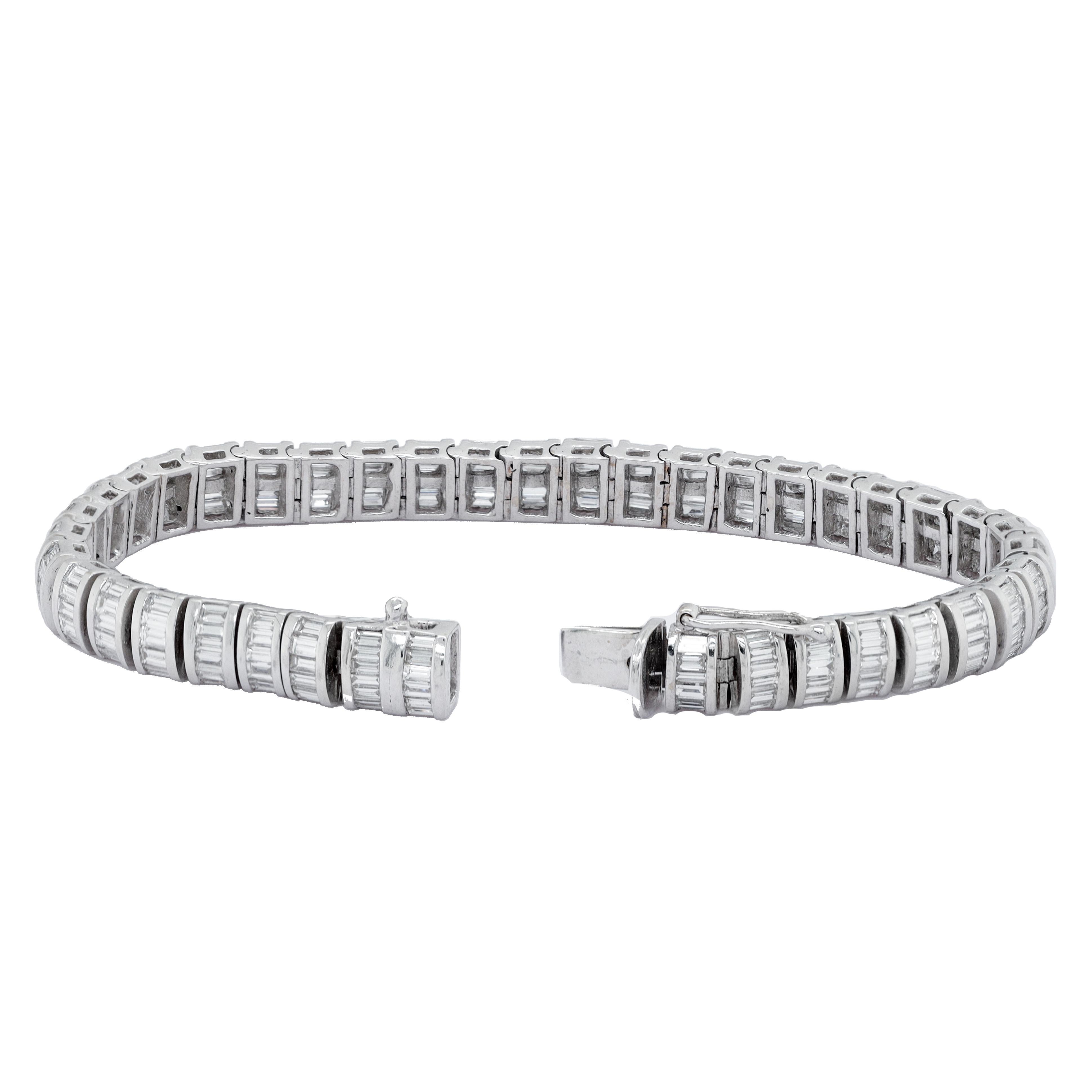 18 kt white gold diamond tennis bracelet adorned with 8.41 cts tw of horizontally channel set baguette cut diamonds (VS clarity)
Diana M. is a leading supplier of top-quality fine jewelry for over 35 years.
Diana M is one-stop shop for all your