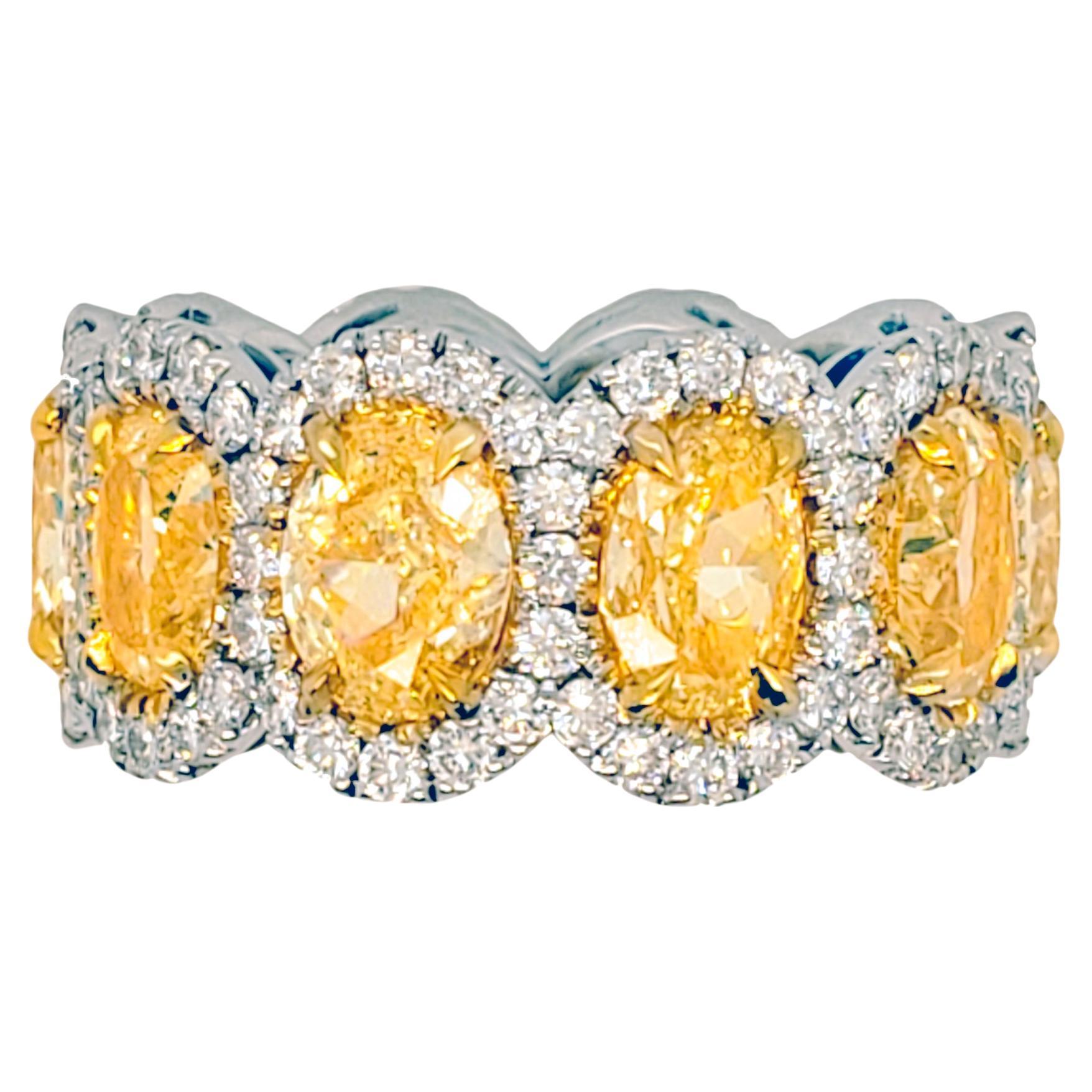 Diana M. 18KT TWO TONE GOLD YELLOW DIAMONDS WITH HALO OVAL BAND.  For Sale