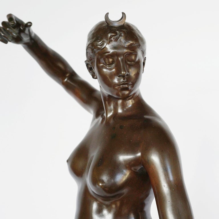 'Diana the Huntress' ?a large Art Nouveau bronze sculpture by Jean Alexandre Joseph Falguière depicting Diana the huntress in motion having just loosened an arrow from her bow, standing on a naturalistic bronze base. signed A Falguière with foundry