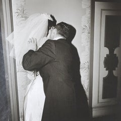 Groom Kissing His Bride
