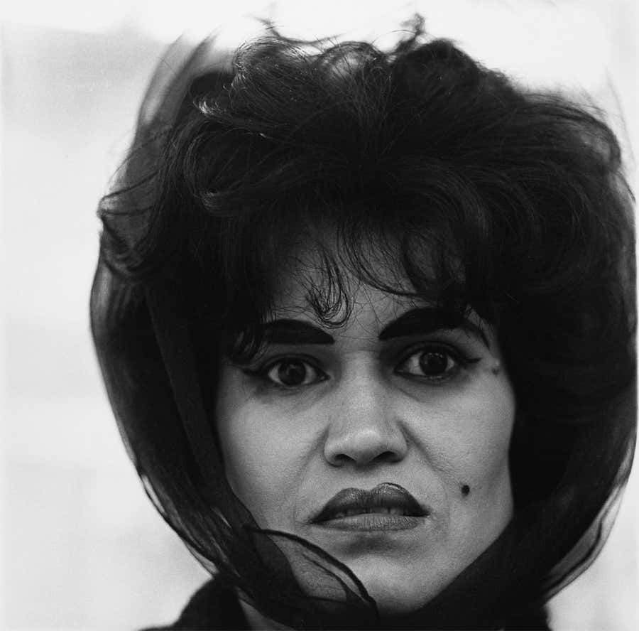 Puerto Rican woman with a beauty mark