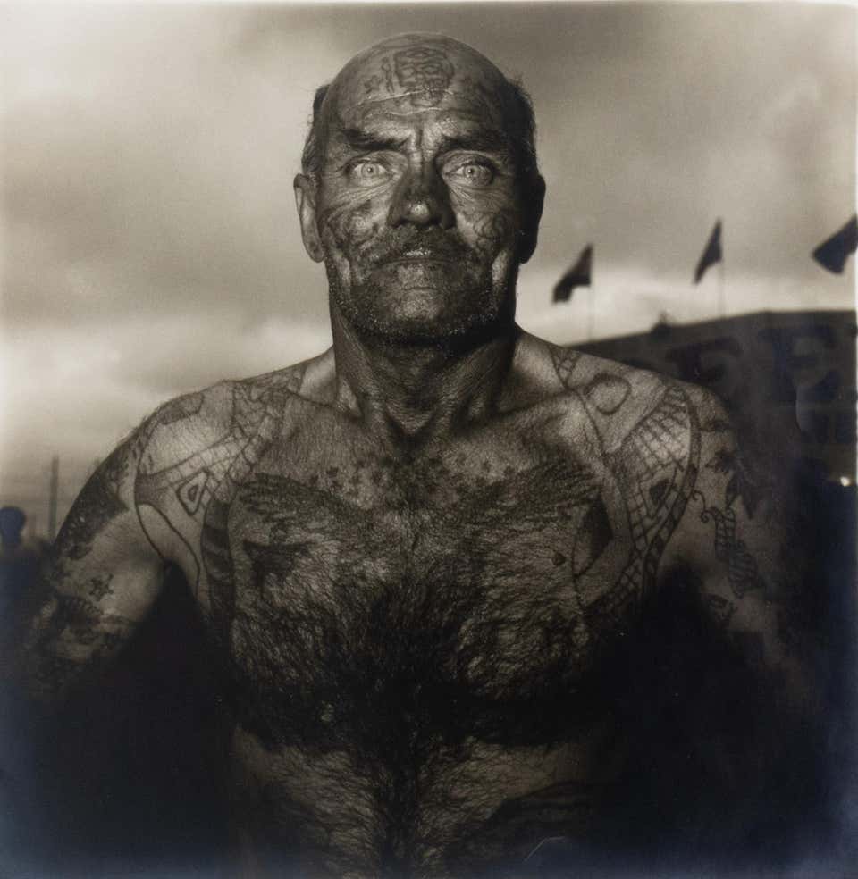 Tattooed Man at a Carnival