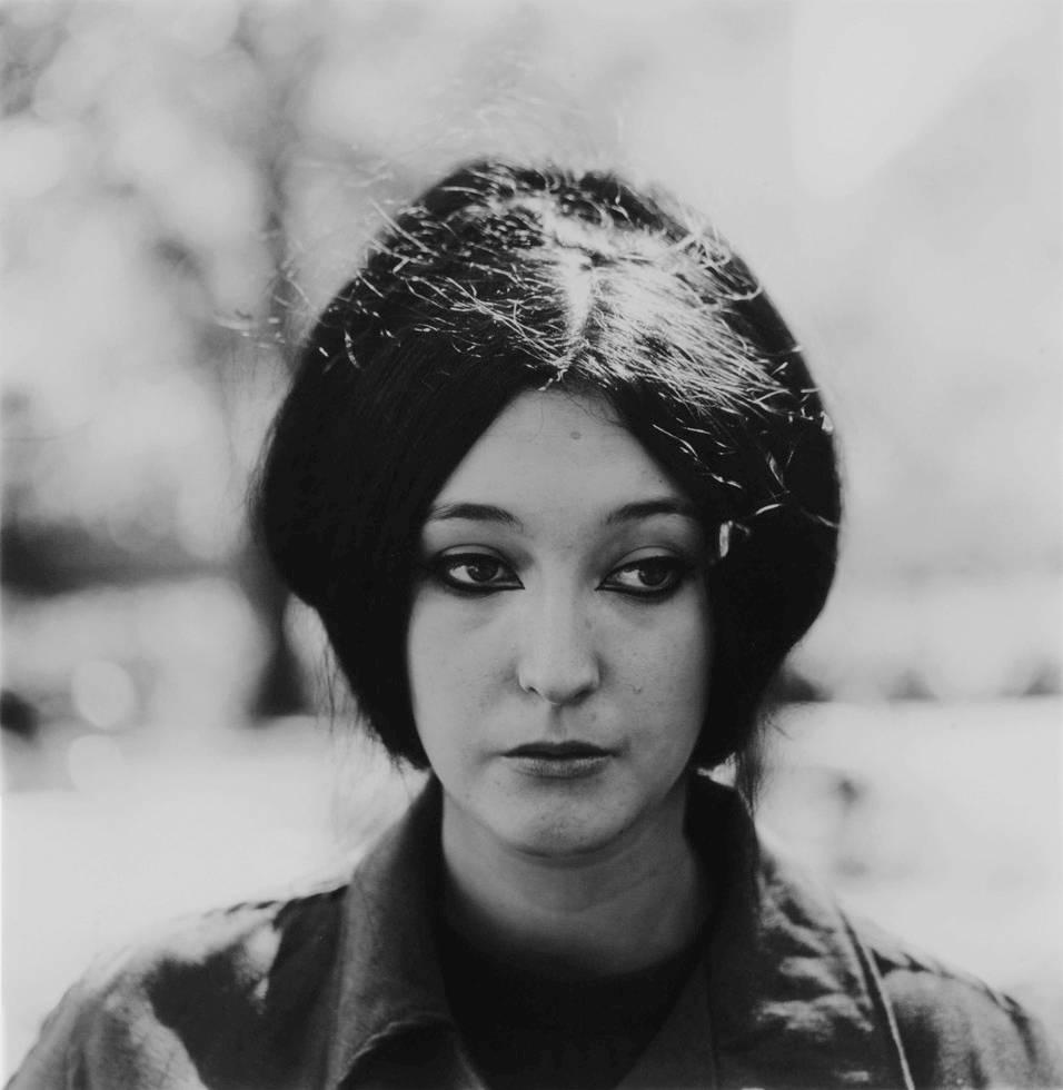 Diane Arbus Black and White Photograph - Woman with Eyeliner, NYC