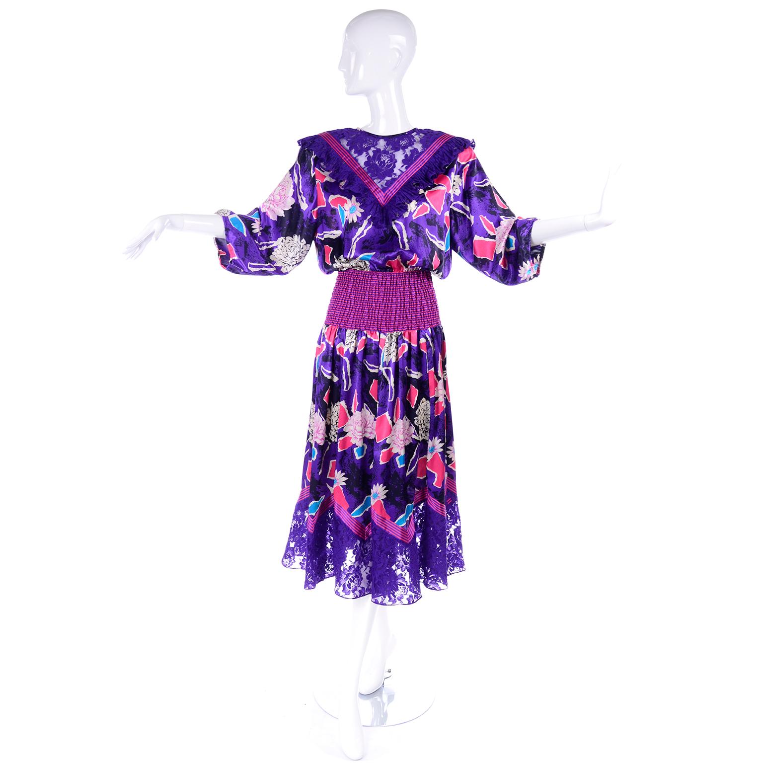 This is a beautiful 1980's Diane Freis floral dress! It has a Victorian style neckline, with illusion floral lace and ruffles. It has a shirred waistband as well as purple lace along the hem. There are 3/4 length puff sleeves and the fabric has a