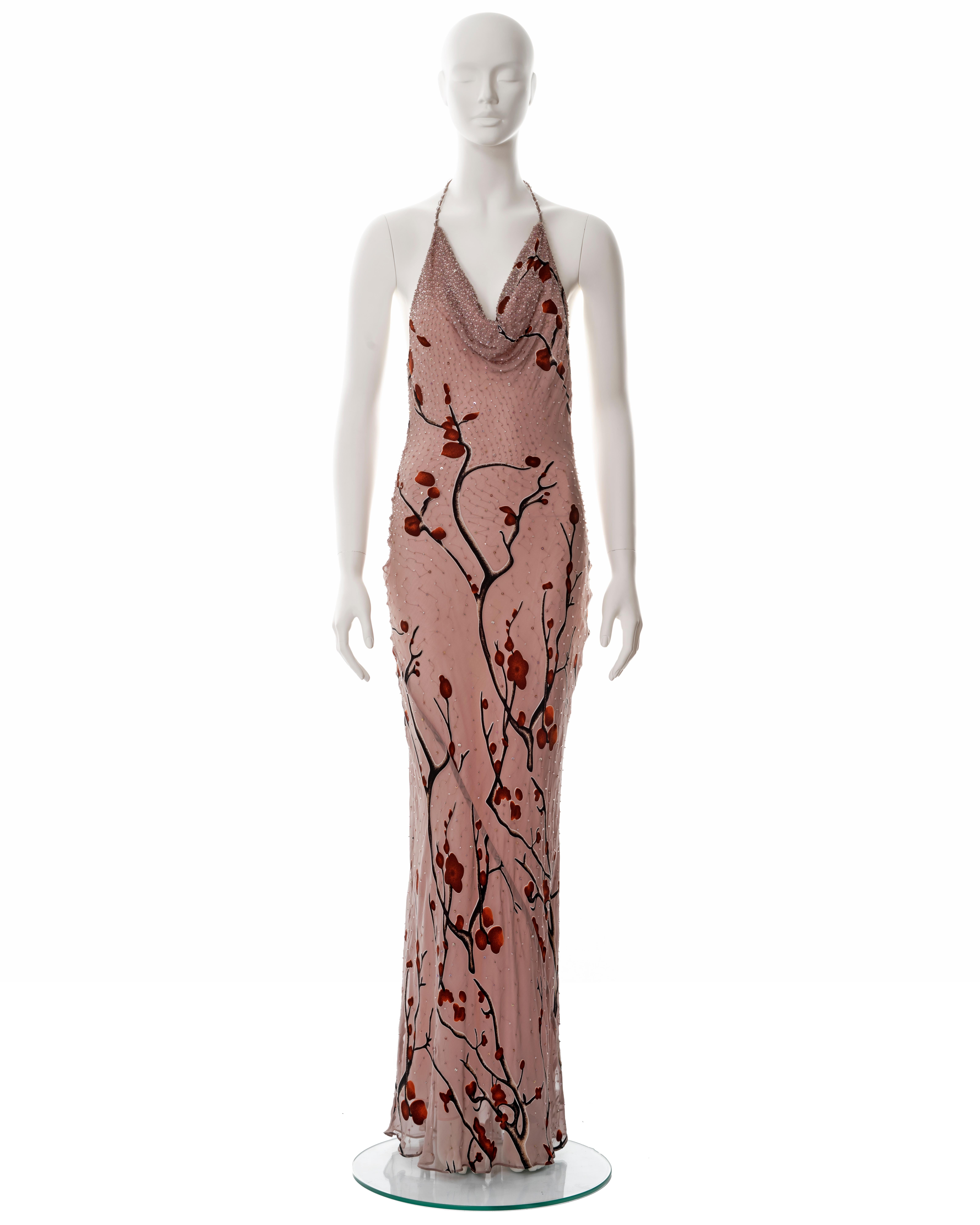 ▪ Diane Freis pink hand-beaded chiffon halter-neck evening dress
▪ c. 2000
▪ Cherry blossom print 
▪ Cowl neck 
▪ Beaded halter-neck ties with tassels  
▪ Acetate lining 
▪ FR 40 - UK 12 - US 8 

All photographs in this listing EXCLUDING any