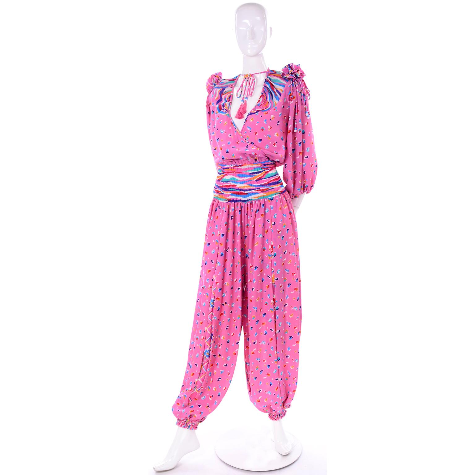 This is one of the coolest jumpsuits we've come across. Designed by Diane Freis in the 1980's, we love that her pieces are made specifically to fit on a wide range of sizes! This jumpsuit wraps in front and has an elastic waist.  The wide legs have