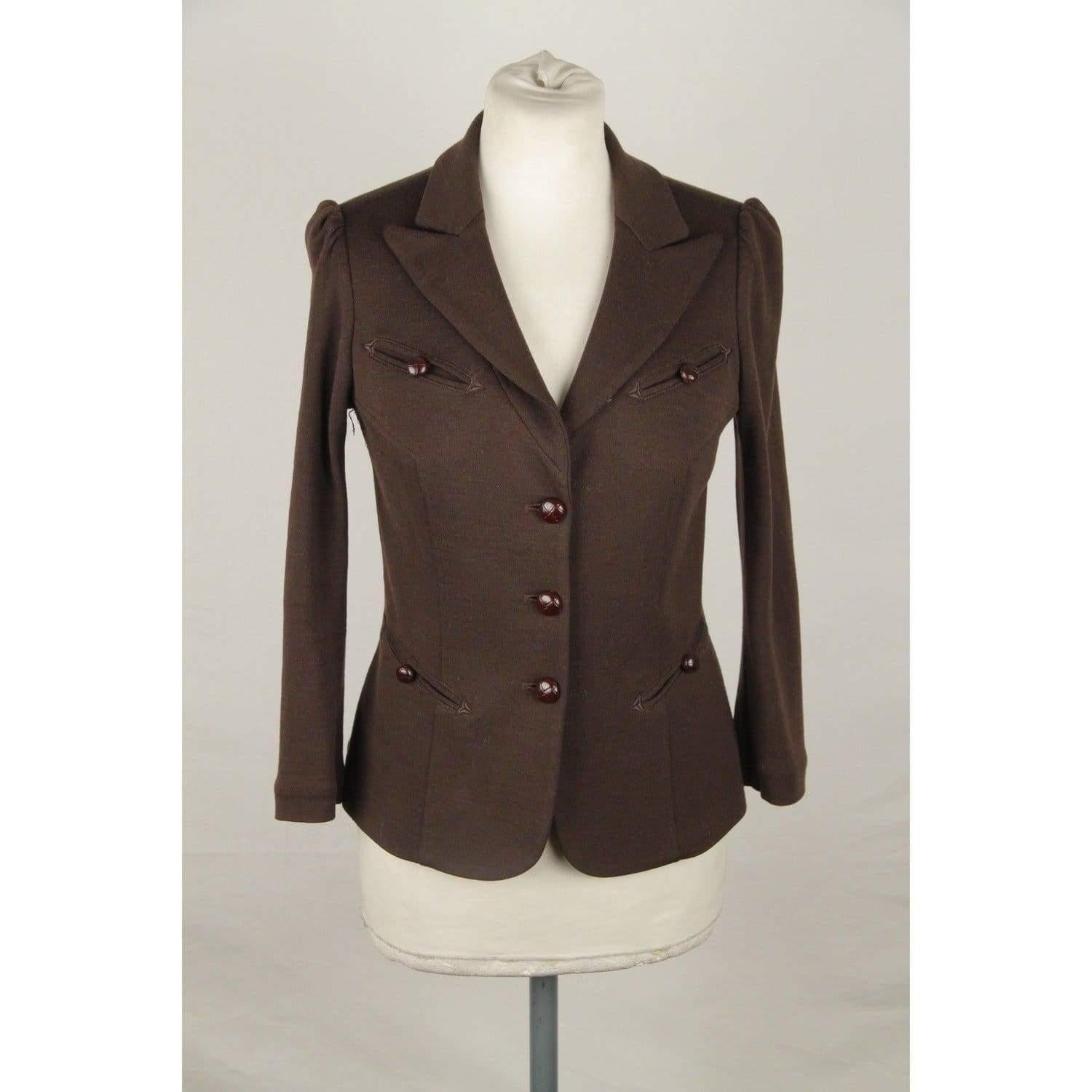 MATERIAL: Wool COLOR: Brown MODEL: Blazer GENDER: Women SIZE: Small CONDITION RATING: A :EXCELLENT CONDITION - Used once or twice. Looks mint. Imperceptible signs of wear CONDITION DETAILS: Gently used MEASUREMENTS: SHOULDER TO SHOULDER: 14 inches -