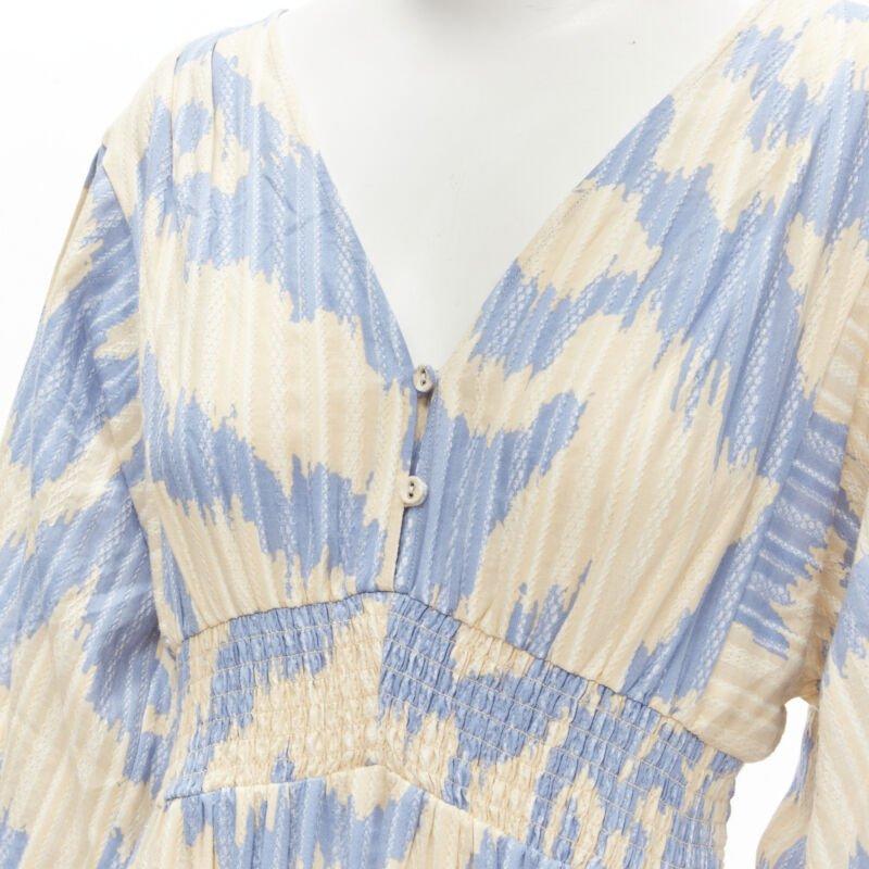DIANE VON FURSTENBERG beige blue print lattice embroidery puff sleeve dress US8
Reference: KNLM/A00133
Brand: Diane von Furstenberg
Material: Cotton
Color: Blue, Beige
Pattern: Abstract
Closure: Button
Extra Details: Button front. Elasticated waist.