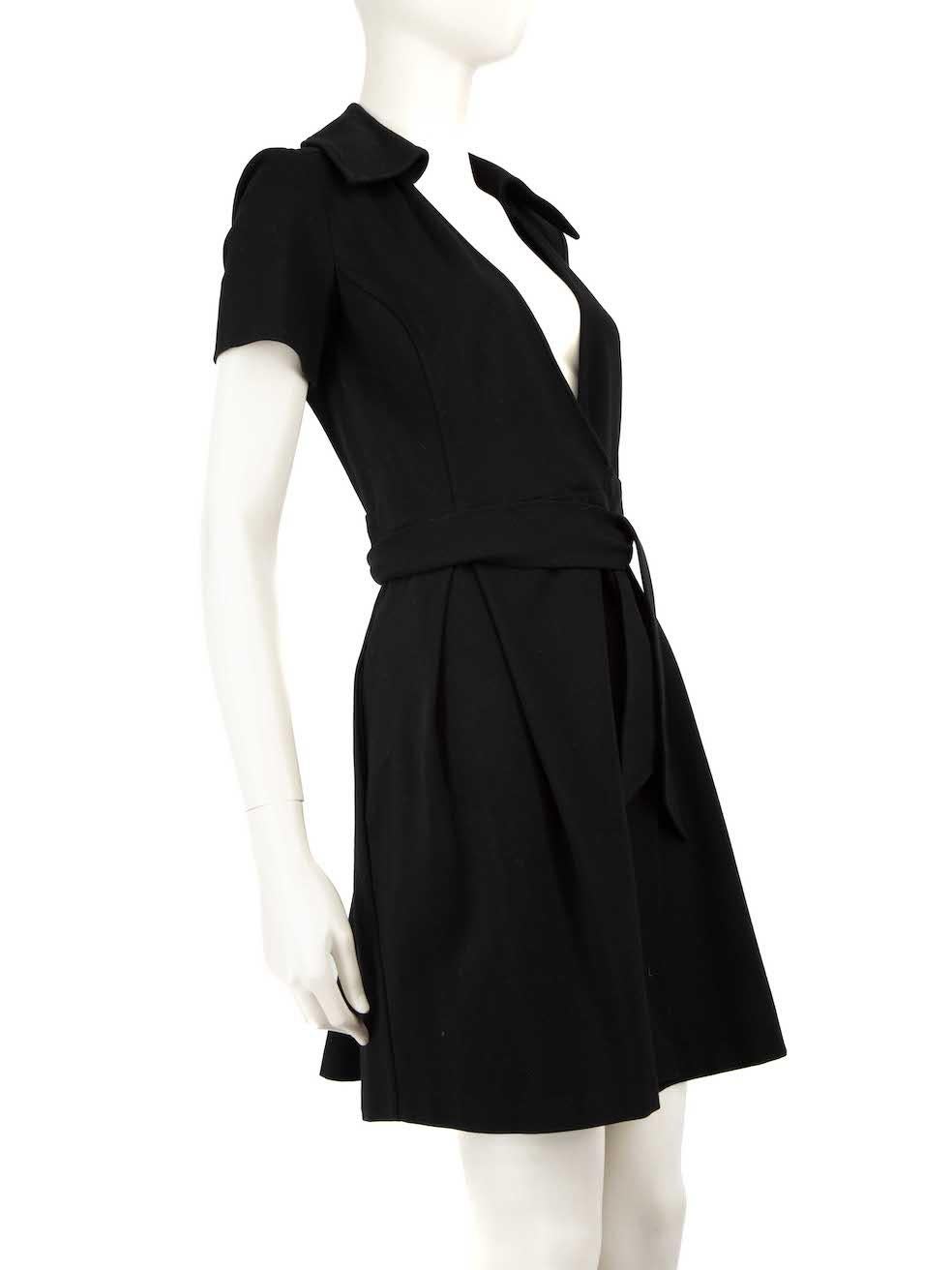 CONDITION is Very good. Hardly any visible wear to the dress is evident on this used Diane Von Furstenberg designer resale item.
 
 
 
 Details
 
 
 Black
 
 Viscose
 
 Wrapdress
 
 Knee length
 
 Tie waisted belt
 
 Short sleeves
 
 Collared
 
