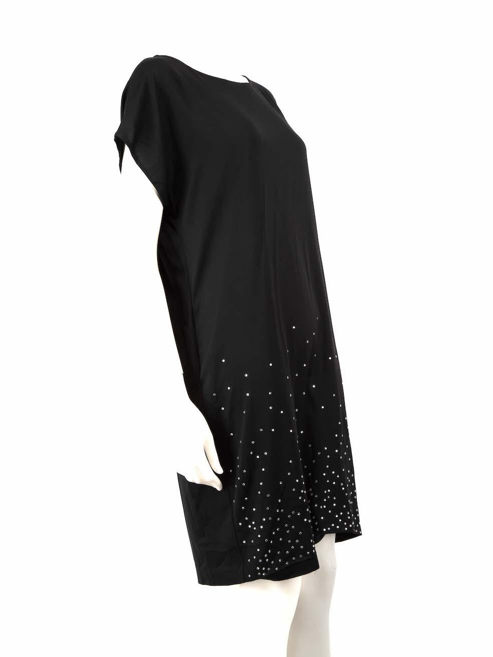 CONDITION is Very good. Minimal wear to the dress is evident. Minimal wear to the hemline of the dress is seen with a pull to the weave on this used Diane Von Furstenberg designer resale item.
 
 
 
 Details
 
 
 Black
 
 Silk
 
 Mini dress
 
 Round