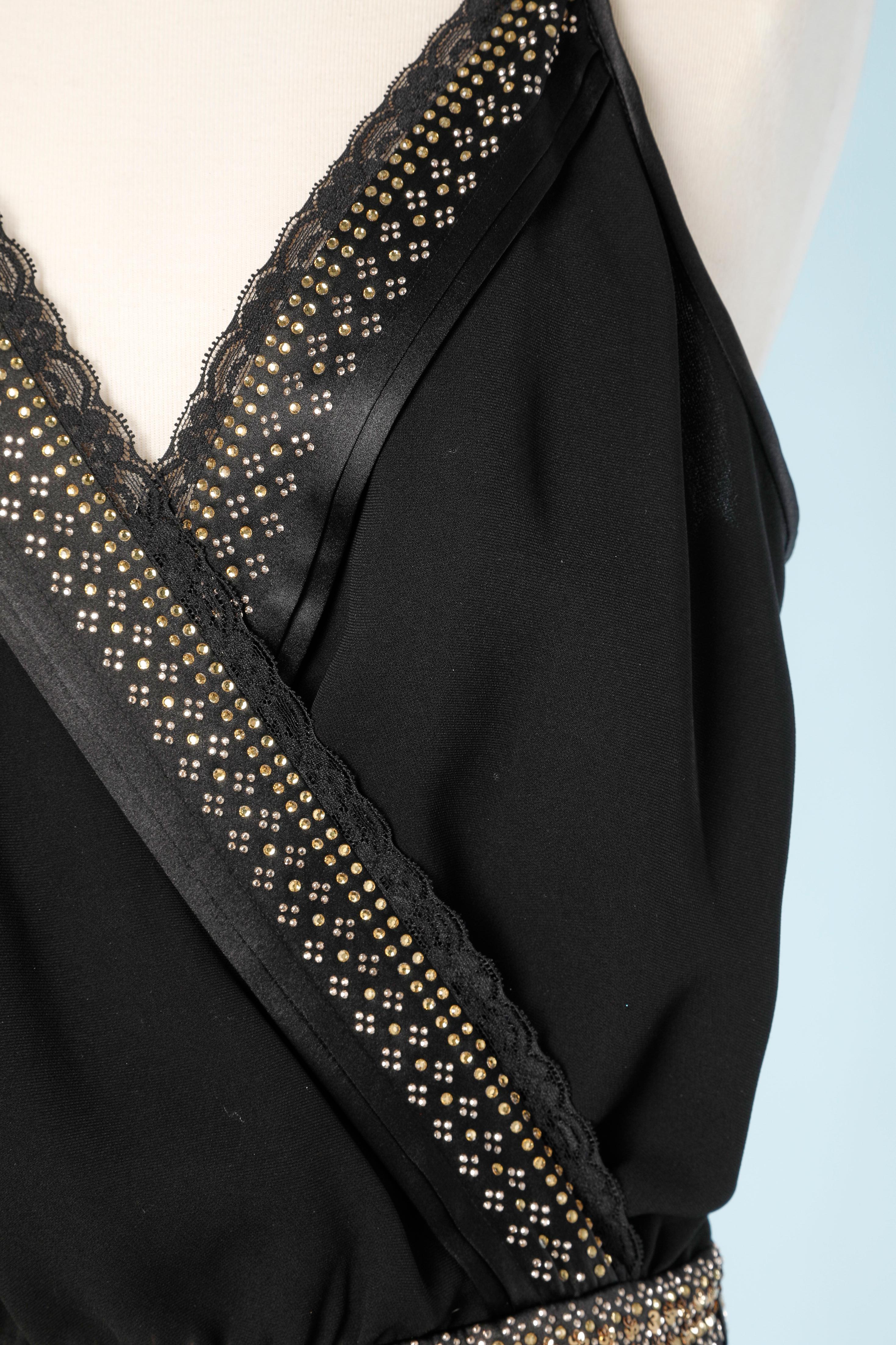 Black jumpsuit in silk and spandex, rhinestones on the belt and neckline