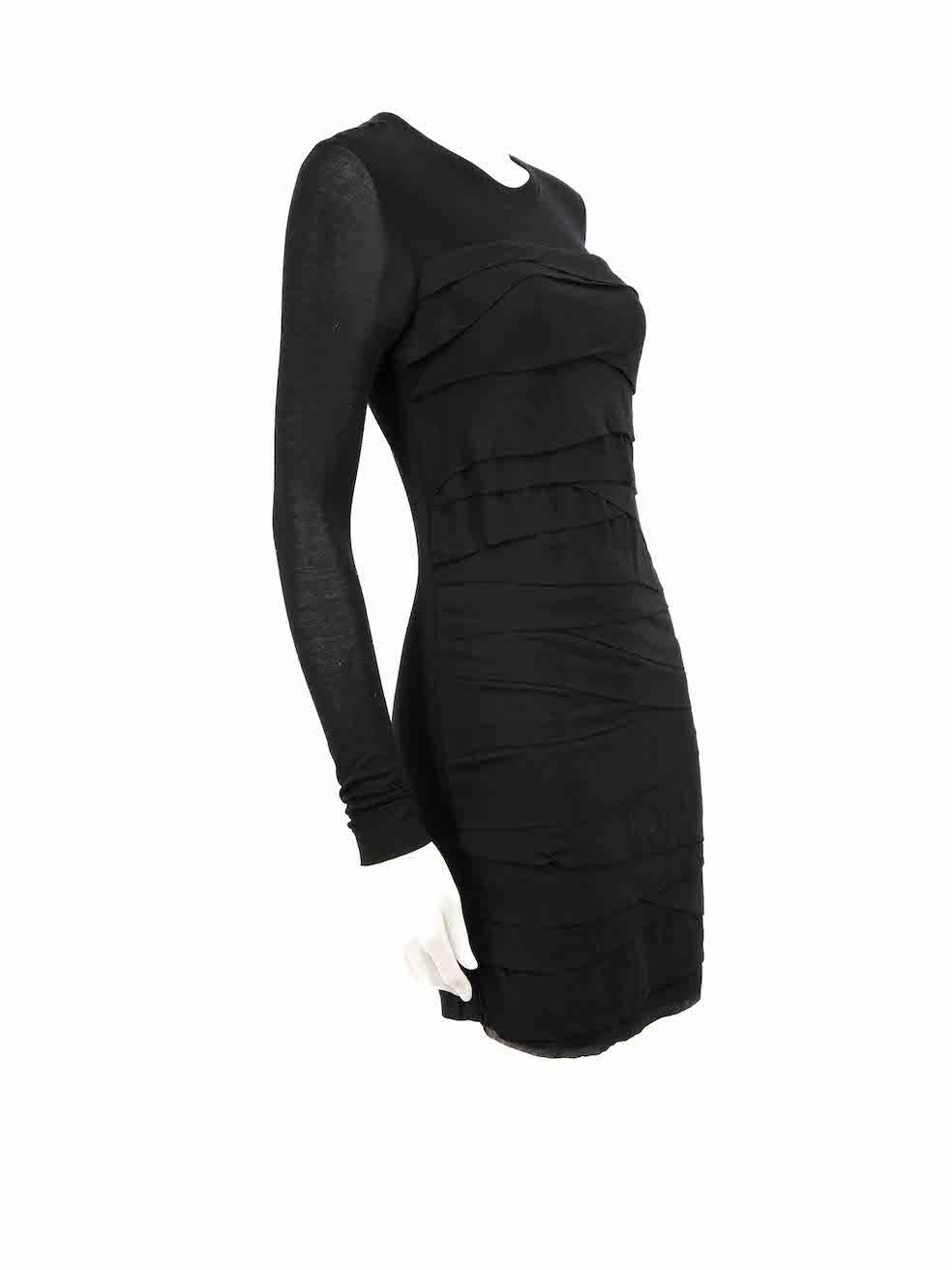 CONDITION is Very good. Minimal wear to dress is evident. Minimal wear to both sleeves with pilling to the underarms and a small hole to the left arm can be seen on this used Diane Von Furstenberg designer resale item.
 
 
 
 Details
 
 
 Black
 
