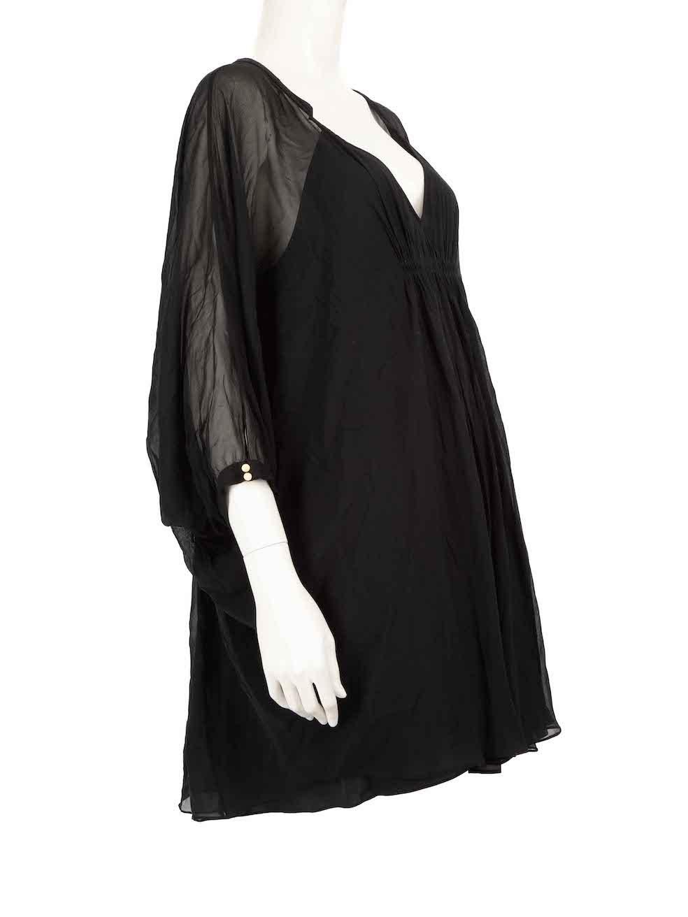CONDITION is Very good. Hardly any visible wear to dress is evident on this used Diane Von Furstenberg designer resale item.



Details


Black

Silk

Dress

Long sheer batwing sleeves

Knee length

V-neck

Front ruched details

Buttoned