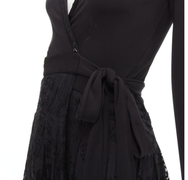 DIANE VON FURSTENBERG black silk bead embellished wrap maxi dress US0 XS
Reference: JACG/A00033
Brand: Diane von Furstenberg
Material: Silk, Blend
Color: Black
Pattern: Solid
Closure: Self Tie
Extra Details: Bead embellishment along neckline. Side