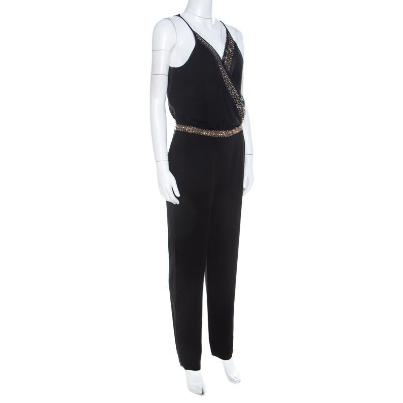 What's not to love about this jumpsuit from Diane Von Furstenberg! It flaunts crystal embellished trims and a sleeveless style. A pair of black sandals will complement the jumpsuit beautifully.

Includes: The Luxury Closet Packaging

The Luxury