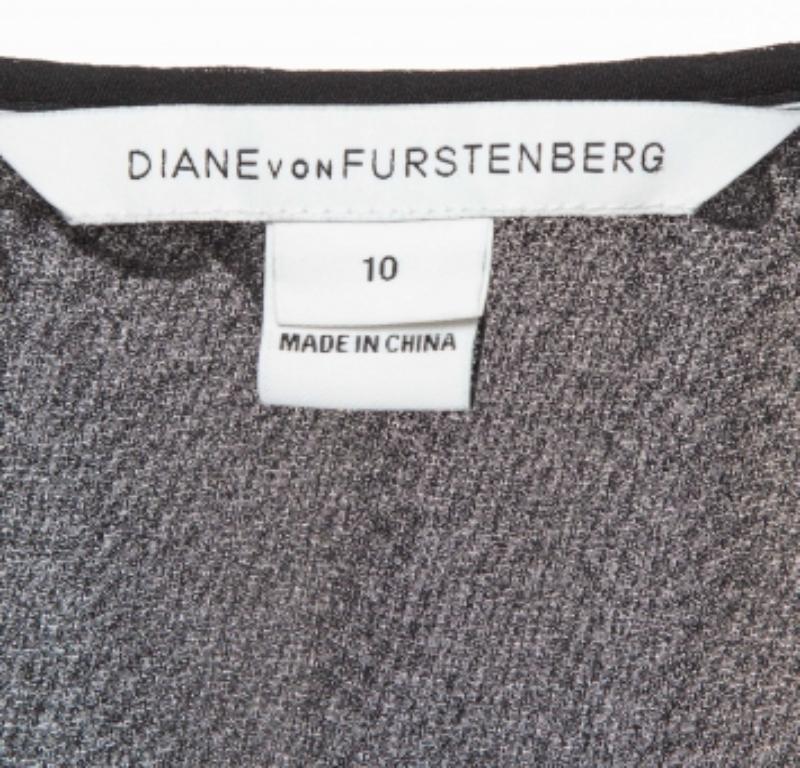 Diane von Furstenberg Top in seta nera con dettaglio volant M. In condizioni ottime in vendita a Dubai, Al Qouz 2