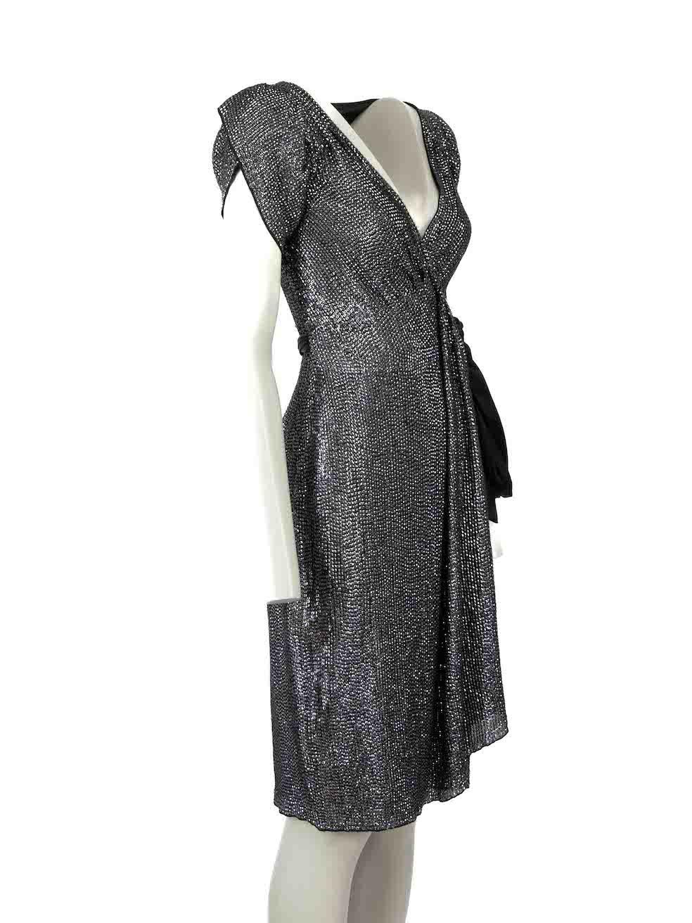 CONDITION is Very good. Hardly any visible wear to dress is evident on this used Diane Von Furstenberg designer resale item.
 
 Details
 Black
 Silk
 Wrap dress
 Short sleeves
 V-neck
 Sequin embellished
 Midi
 
 Made in China
 
 Composition
 100%