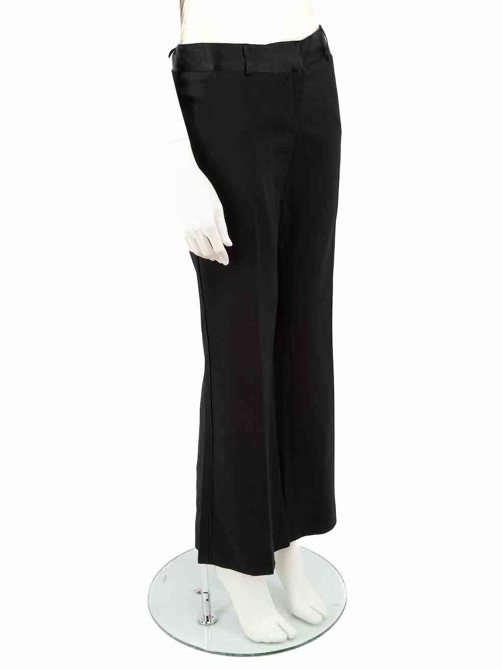 CONDITION is Very good. Hardly any visible wear to trousers is evident on this used Diane Von Furstenberg designer resale item.
 
 Details
 Black
 Synthetic
 Wide leg trousers
 Low rise
 Satin waistband
 Belt hoops
 Front zip closure with clasps and