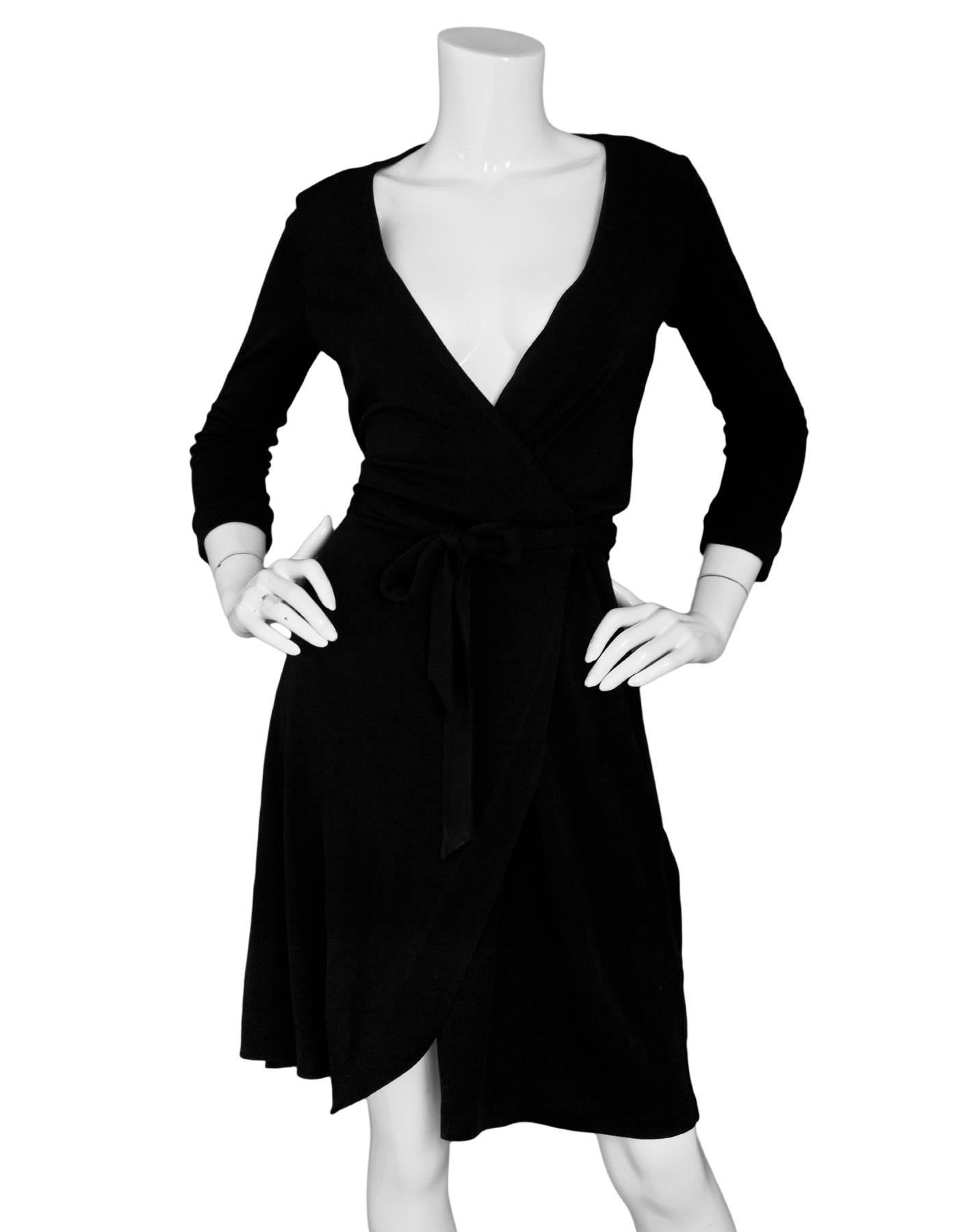 Diane von Furstenberg Black Wrap Dress Sz 4

Made In: USA
Color: Black
Composition: 85% viscose, 15% polyamide
Lining: None
Closure/Opening: Wrap tie closure
Exterior Pockets: None
Overall Condition: Excellent pre-owned condition, some stains at
