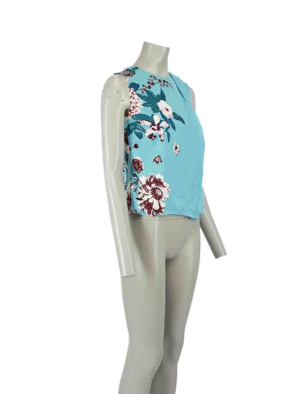 CONDITION is Never worn. No visible wear to top is evident on this new Diane Von Furstenberg designer resale item.
 
 Details
 Blue
 Viscose
 Tank top
 Floral print pattern
 Round neckline
 Layered panel accent
 Back zip closure with hook and eye
 
