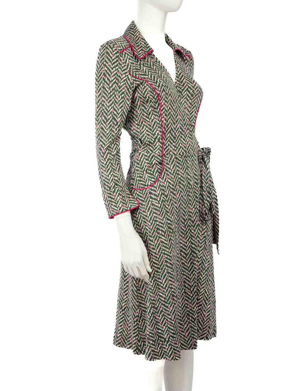 CONDITION is Very good. Hardly any visible wear to dress is evident on this used Diane von Furstenberg designer resale item.
 
 
 
 Details
 
 
 Green
 
 Silk
 
 Wrap dress
 
 Midi length
 
 Dotted pattern
 
 V neckline
 
 Mid sleeves
 
 2x Front