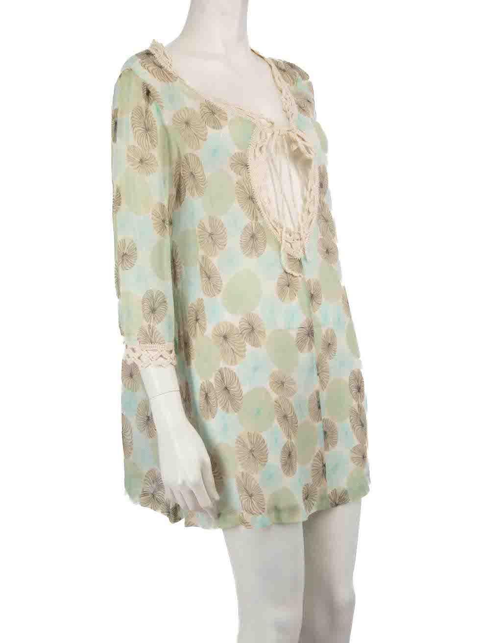 CONDITION is Very good. Minimal wear to dress is evident. There is a small tear to the fabric at the right side underarm seam on this used Diane von Furstenberg designer resale item.
 
 Details
 Green
 Cotton
 Beach cover up top
 Abstract floral