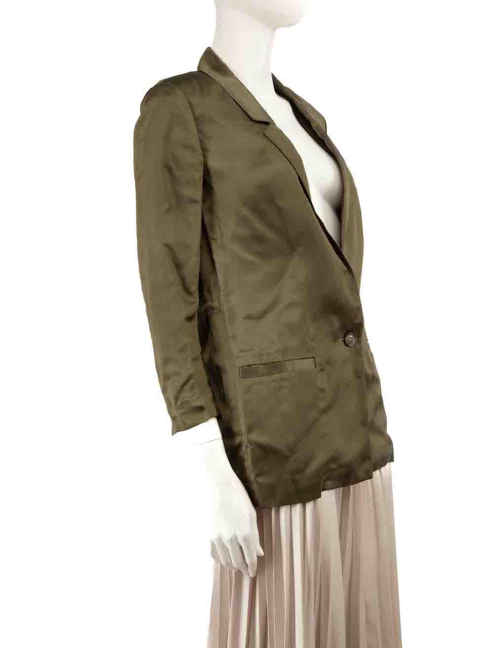 CONDITION is Very good. Minimal wear to jacket is evident. Minimal wear to the fabric surface with a couple of pulls to the weave found at the cuffs on this used Diane Von Furstenberg designer resale item.
 
 Details
 Khaki
 Cupro
 Blazer
 Button