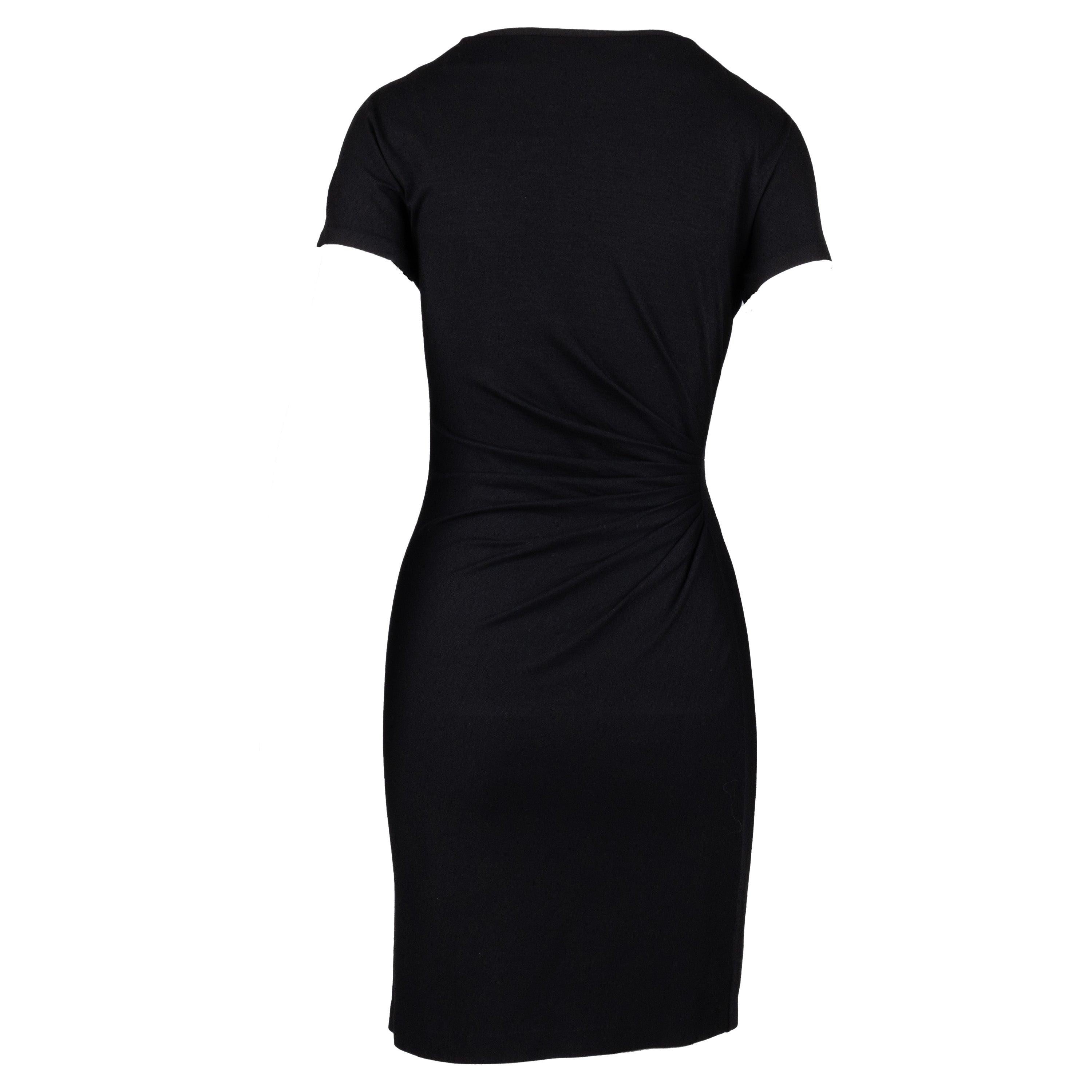This Diane Von Furstenberg midi dress features a sleek silhouette of short sleeves and soft ruching at the waist. Crafted from a blend of viscose and lycra, this dress features a flattering body hugging fit and an asymmetric hem.
 Remarks: There are