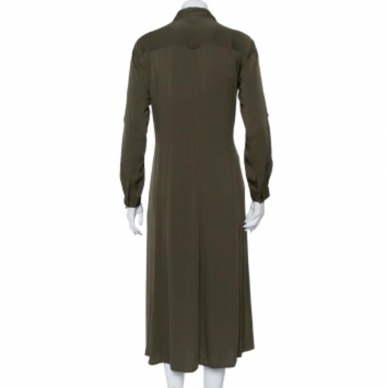 A casual, stylish shirt dress from Diane von Furstenberg that you can pair with both heels and flats. It is made from silk and features long sleeves, front buttons, two pockets, and an attached belt.