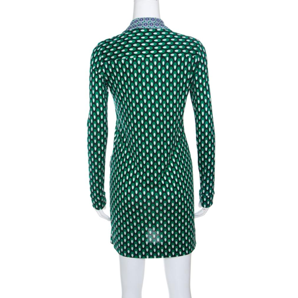 Look your stylish best in this dress from the house of Diane Von Furstenberg. Wear this multicolored piece with sneakers for an eccentric look. Tailored in silk into a shirt silhouette, this will be your go-to outfit for any occasion.

Includes: The