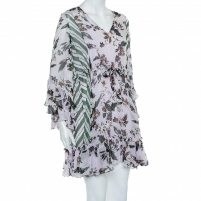This mini dress comes from the iconic label of Diane Von Furstenberg. It has an oversized silhouette and is made from 100% silk in lovely hues. It is designed with ruffles and comes with a V-neckline and long sleeves. Pair it with slingback sandals