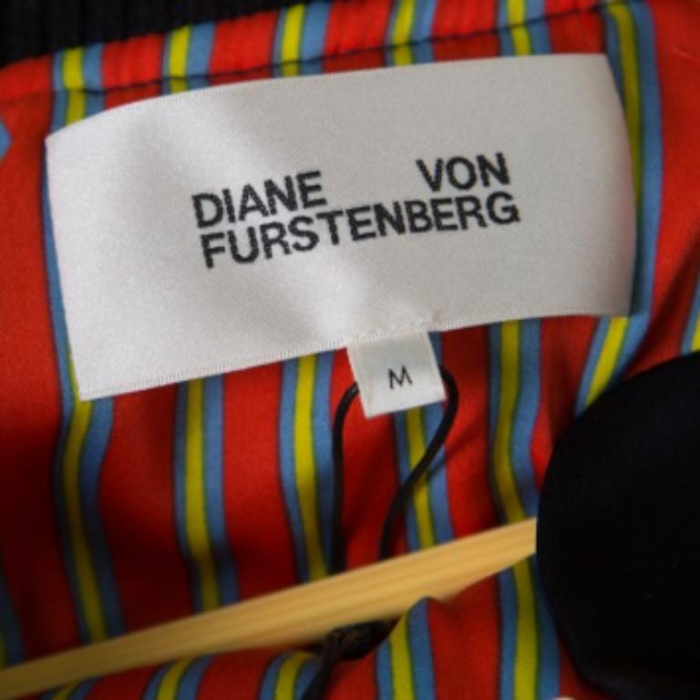 A favourite worldwide, Diane Von Furstenberg never fails to impress and this lovely Alexander bomber jacket is a testimony to that. The navy blue creation is made of a satin blend and features a chic silhouette. It flaunts a ribbed collar neckline,