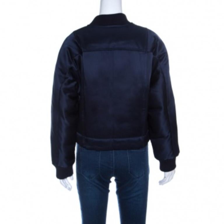 A favourite worldwide, Diane Von Furstenberg never fails to impress and this lovely Alexander bomber jacket is a testimony to that. The navy blue creation is made of a satin blend and features a chic silhouette. It flaunts a ribbed collar neckline,