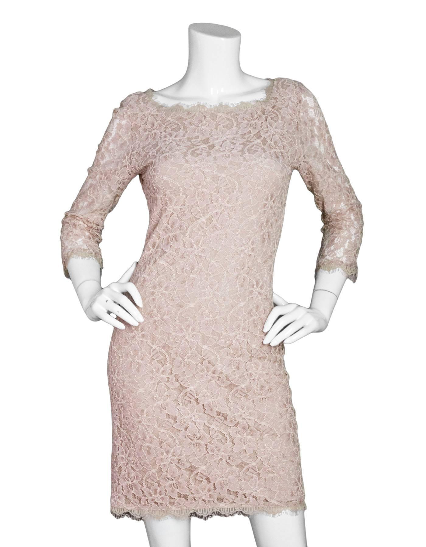 Diane von Furstenberg Nude Lace Dress Sz 6

Made In: USA
Color: Nude
Composition: 70% rayon, 30% nylon
Lining: Nude lining
Closure/Opening: Exposed back zip closure
Exterior Pockets: None
Overall Condition: Excellent pre-owned condition
Marked Size: