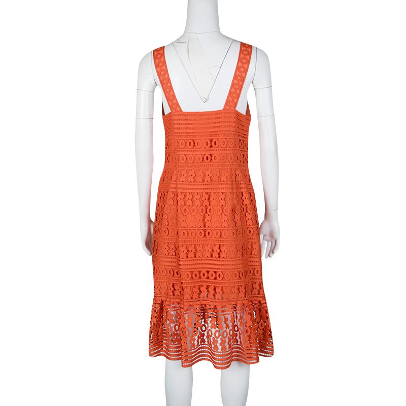 Characterized by a flouncy detail, this orange Tiana dress from the house of Diane Von Furstenberg keeps you at the top of your style game. Featuring a layered lace look, the dress has v-neckline, thick shoulder straps and a sheer hem.

Includes: