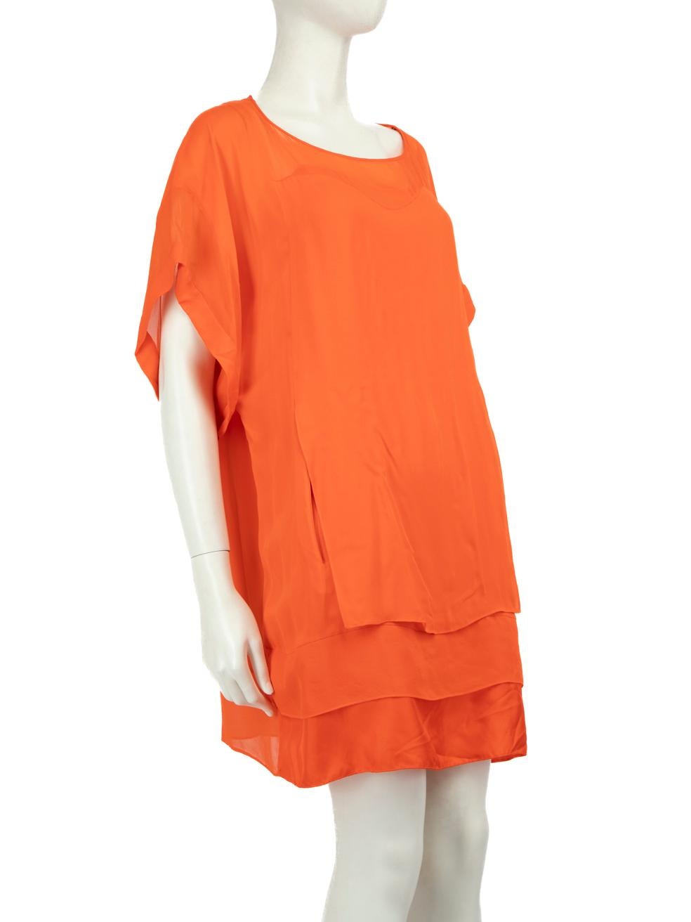 CONDITION is Very good. Hardly any visible wear to dress is evident on this used Diane Von Furstenberg designer resale item.
 
 Details
 Orange
 Silk
 Dress
 Mini
 Round neck
 Short sleeves
 Comes with slip dress
 
 
 Made in China
 
 Composition
