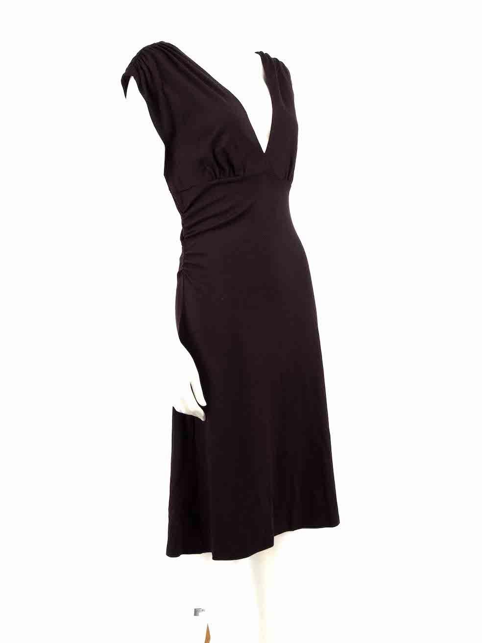 CONDITION is Very good. Hardly any visible wear to dress is evident on this used Diane Von Furstenberg designer resale item.
 
 
 
 Details
 
 
 Dark purple
 
 Wool
 
 Dress
 
 V-neck
 
 Sleeveless
 
 Knee length
 
 Ruched side detail
 
 
 
 
 
