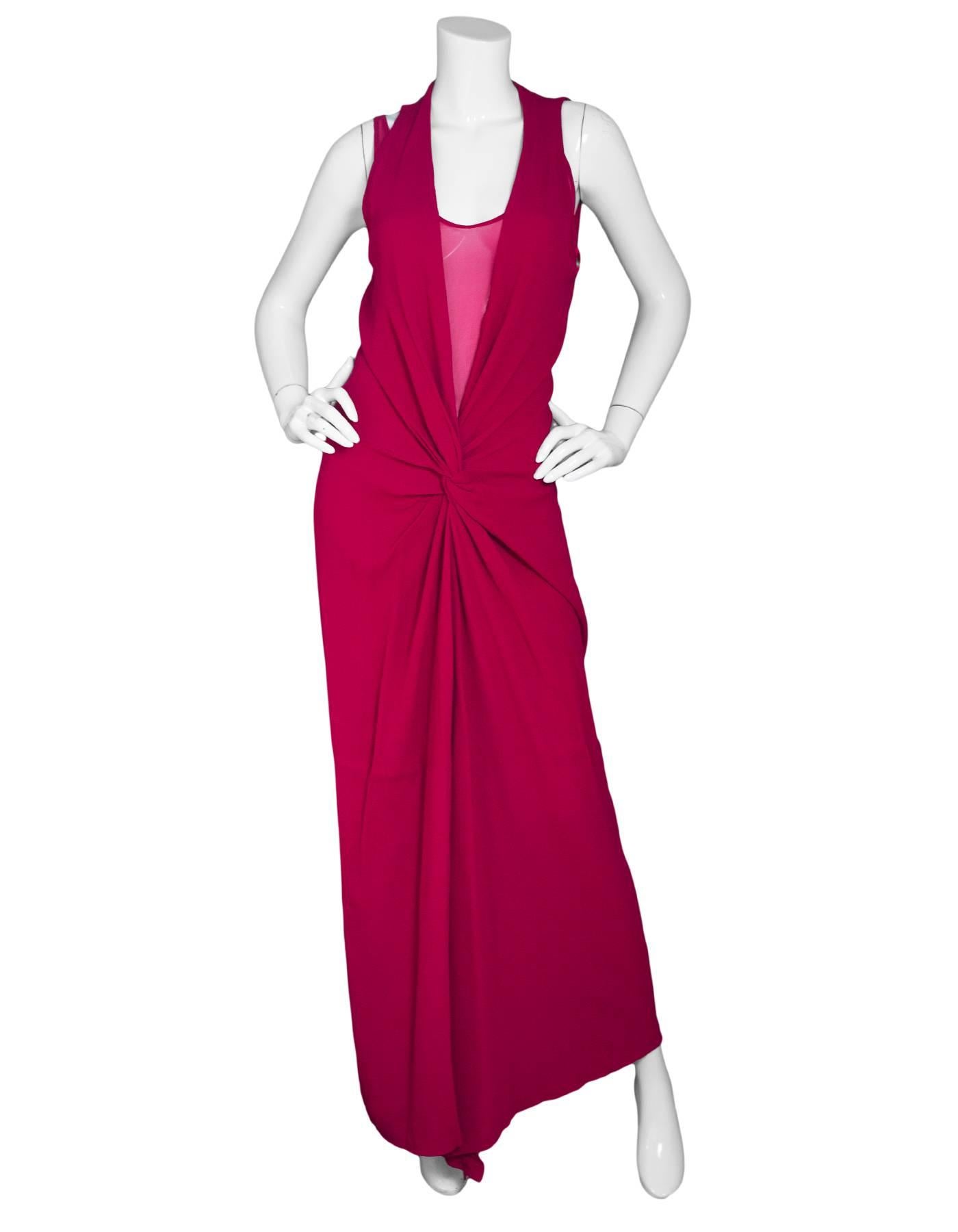 Diane von Furstenberg Red Gown Sz 4 NWT

Made In: China
Color: Red
Composition: 100% polyester
Lining: Red slip
Closure/Opening: Pull over
Exterior Pockets: None
Overall Condition: Excellent pre-owned condition - NWT
Included: DVF tag
Marked Size:
