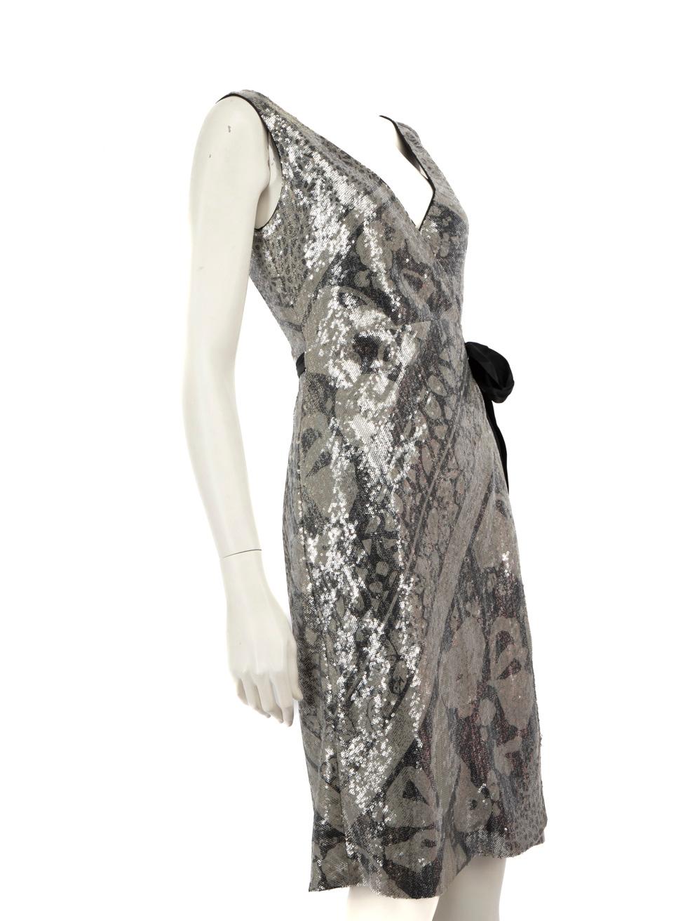 CONDITION is Very good. Hardly any visible wear to dress is evident on this used Diane Von Furstenberg designer resale item.
 
 Details
 Silver
 Polyester
 Wrap dress
 Sequinned abstract pattern
 Knee length
 Sleeveless
 Waist tie fastening
 
 
