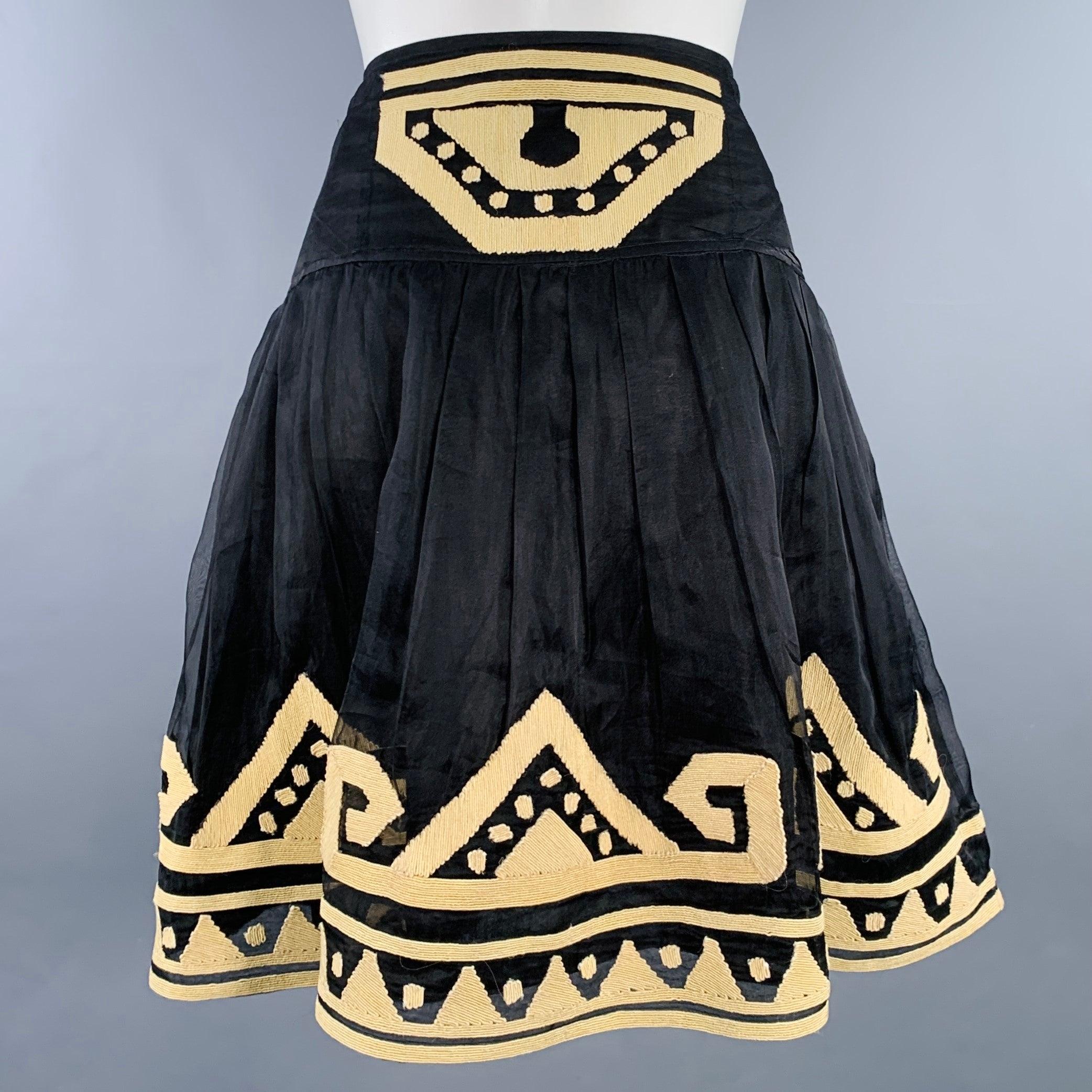 DIANE VON FURSTENBERG skirt
in a black silk featuring a beige embroidered design, pleated style, and invisible side zipper closure. Excellent Pre-Owned Condition. 

Marked:   2 

Measurements: 
  Waist: 29 inches Hip: 35 inches Length: 21 inches 
 