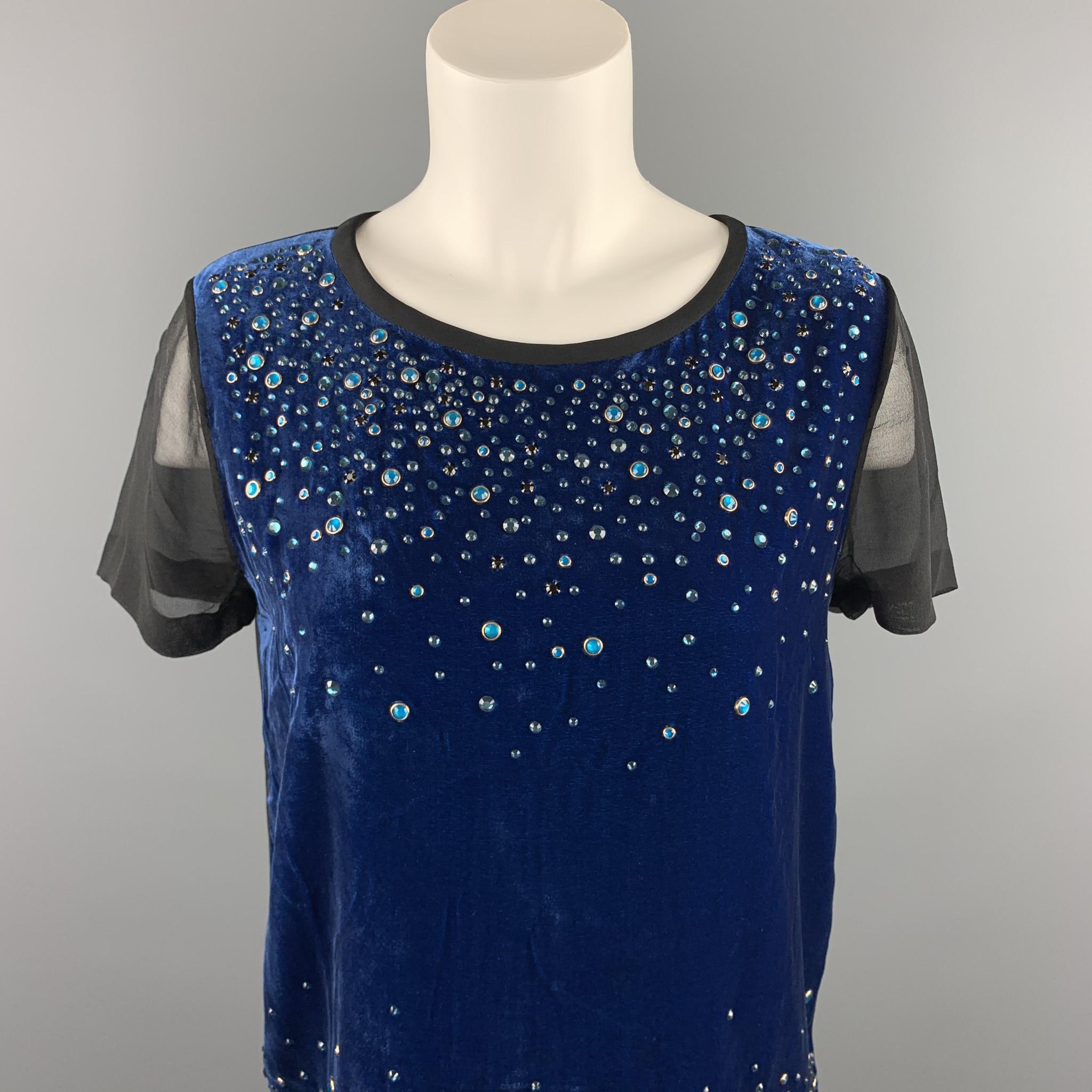 DIANE VON FURSTENBERG blouse comes in a black & blue rayon & silk with rhinestone details featuring a layered style and a back zip up closure.

Very Good Pre-Owned Condition.
Marked: 6

Measurements:

Shoulder: 15.5 in.
Bust: 36 in.
Sleeve: 7 in.