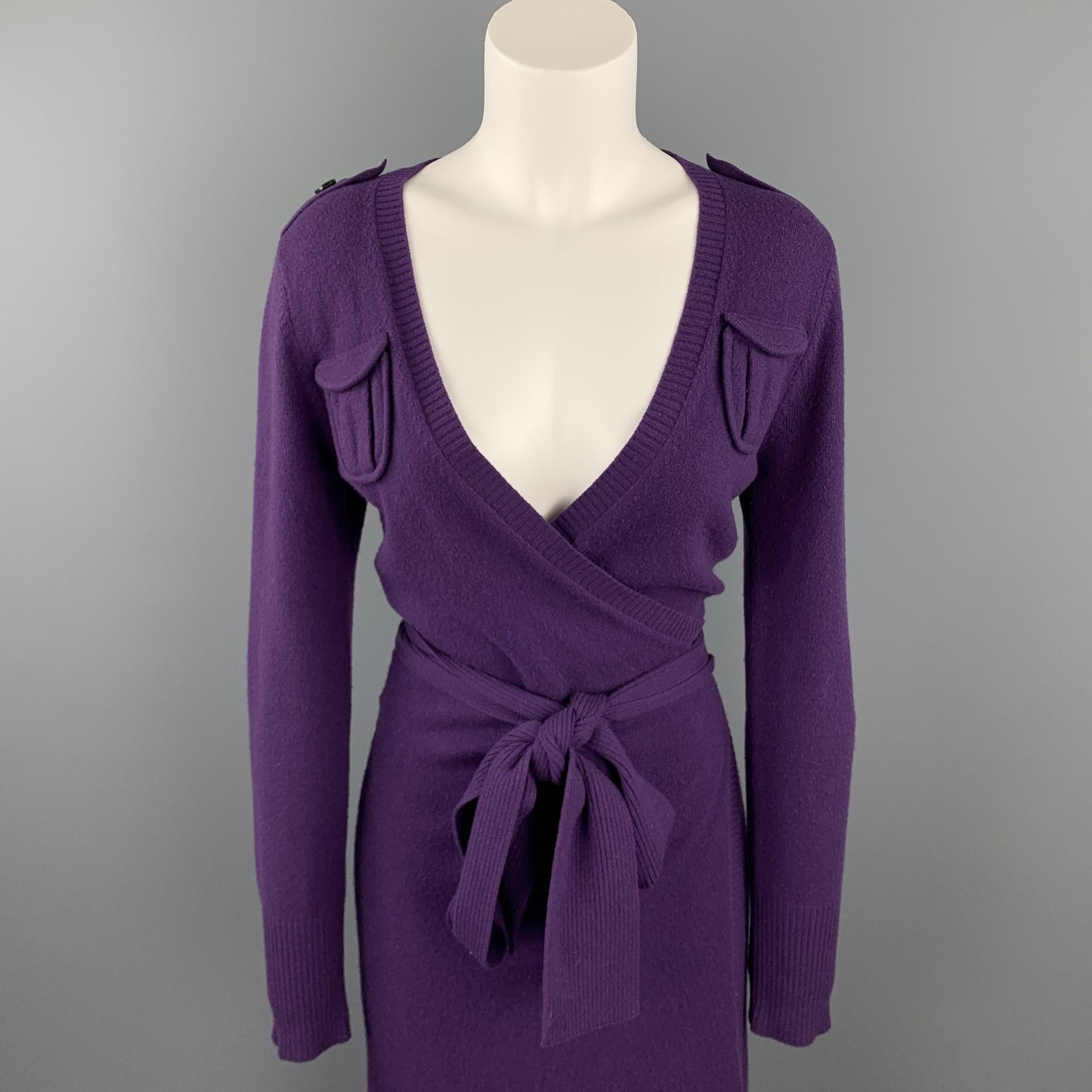 DIANE VON FURSTENBERG dress comes in a purple knitted wool blend featuring a wrap style, front pockets, epaulettes, and a belted closure. 

Good Pre-Owned Condition.
Marked: S

Measurements:

Shoulder: 16 in. 
Bust: 34 in. 
Waist: 25 in.
Hip: 37 in.