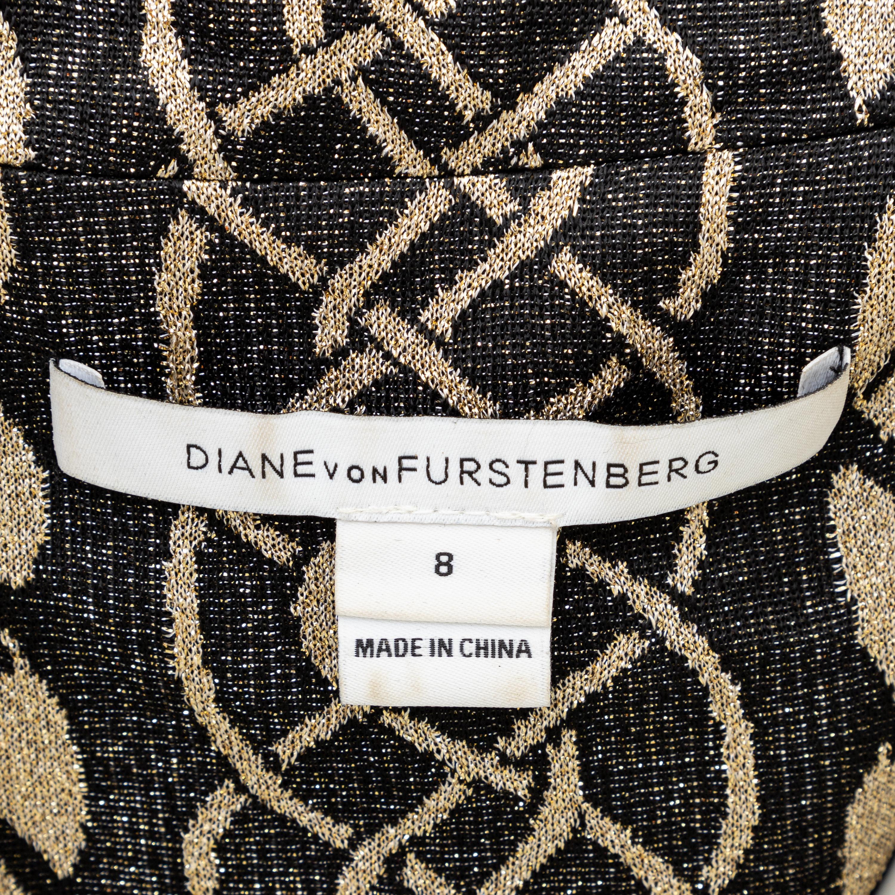 This Diane von Furstenberg dress, made of viscose blend, features a metallic neutral print and long sleeves with a collar. The wrap style dress has tie ribbon that can be tied at the back or side, providing versatility and a flattering fit. 
 

